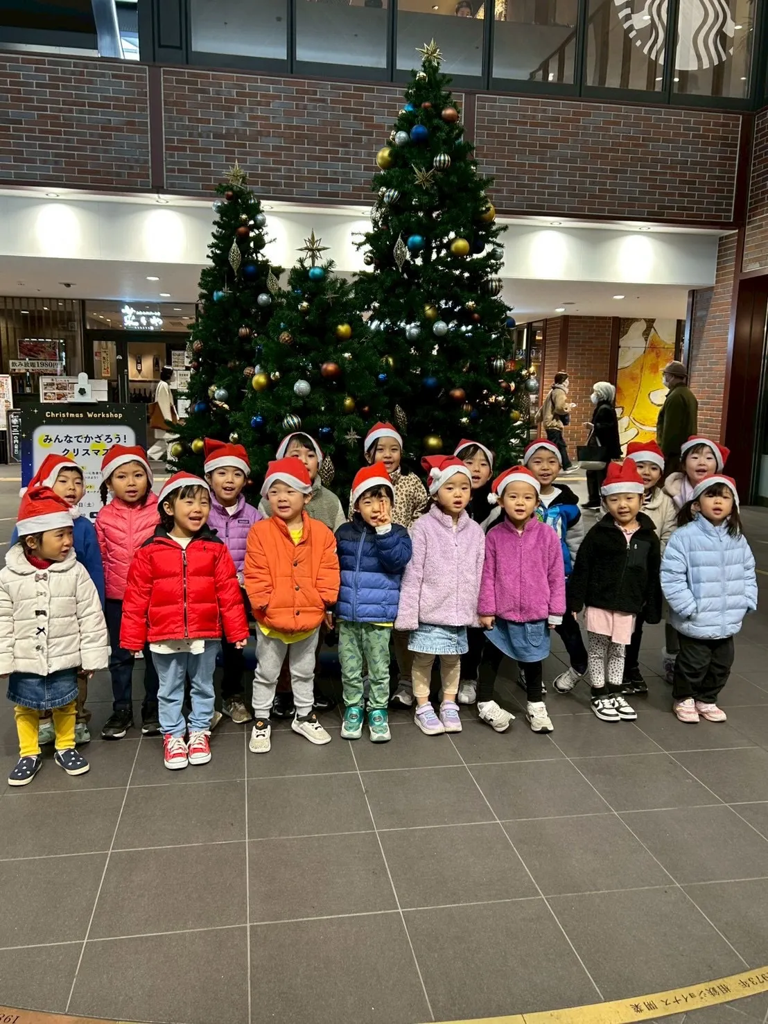 Our adorable little Santas too...